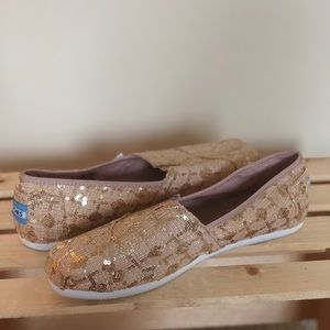 Brand new, never worn Toms